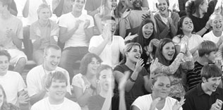 Spectators clapping and cheering.